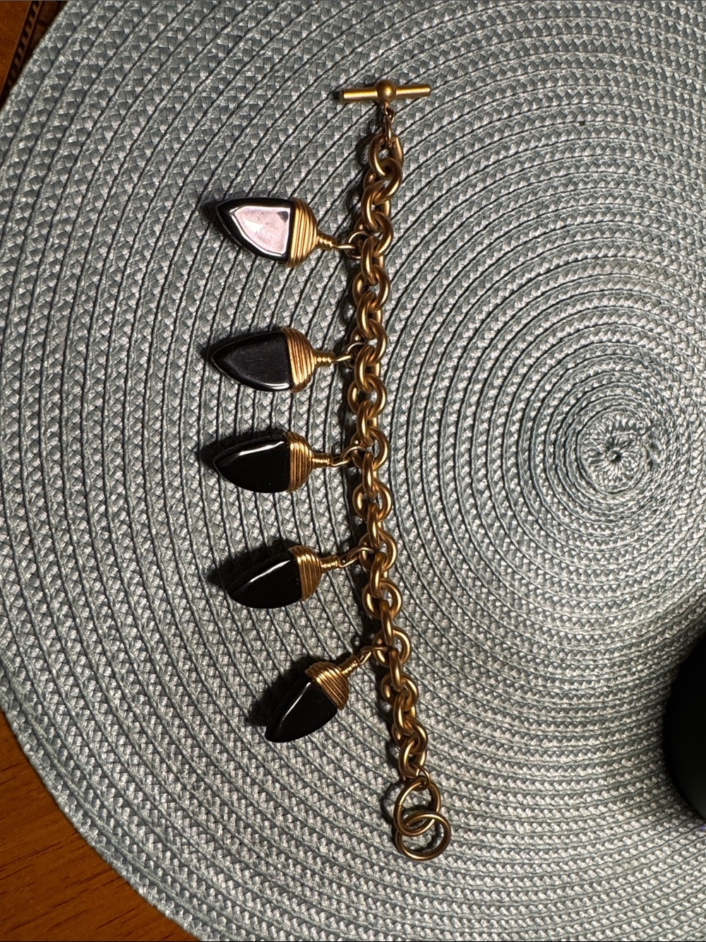 Anne Klein Gold-Tone Charm Bracelet with Black and Pink Teardrops